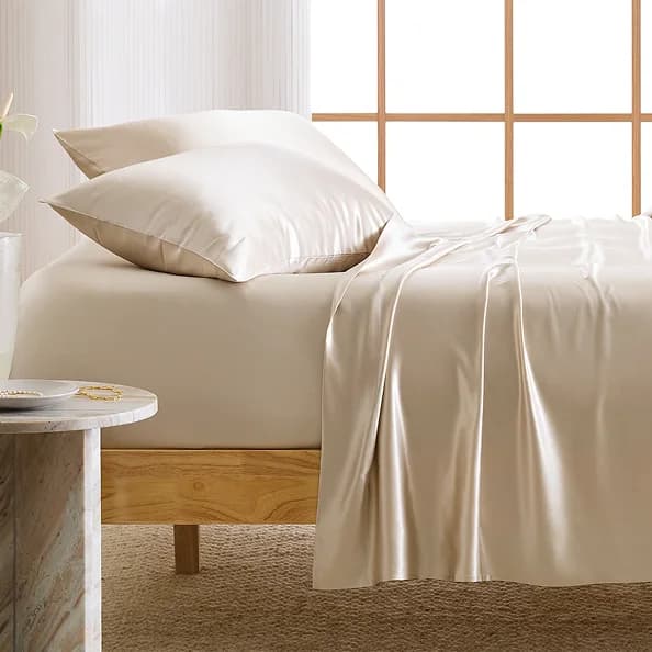 A bedroom styled with Quince silk bedding